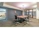 Meeting room with a modern conference table, multiple chairs, and great lighting at 1200 Ponce De Leon Ne Ave # A-19, Atlanta, GA 30306