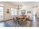 Dining room with hardwood floors, elegant table setting, and view to the outdoor patio at 1200 Ponce De Leon Ne Ave # A-19, Atlanta, GA 30306