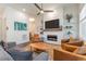Inviting living room with modern fireplace, stylish decor, and comfortable seating at 1200 Ponce De Leon Ne Ave # A-19, Atlanta, GA 30306