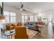 Open-concept living room featuring hardwood floors, and large windows and adjacent dining area at 1200 Ponce De Leon Ne Ave # A-19, Atlanta, GA 30306