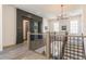 Beautiful staircase with modern lighting and railing and doors to individual apartments at 1200 Ponce De Leon Ne Ave # A-19, Atlanta, GA 30306