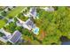Overhead view showcasing the home's backyard, pool, and landscaping near the lake at 3185 Casteel Ne Rd, Marietta, GA 30062