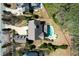 Bird's eye view of the property showing the large lot, house, pool, driveway, and mature trees at 3185 Casteel Ne Rd, Marietta, GA 30062