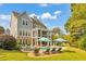 Stunning backyard oasis featuring a beautiful pool, hot tub, screened porch, and manicured landscaping at 3185 Casteel Ne Rd, Marietta, GA 30062
