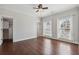 Open bedroom with hardwood floors, a walk-in closet, and large windows at 3185 Casteel Ne Rd, Marietta, GA 30062