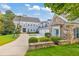 Beautiful two-story home with a stone facade, large driveway and well-maintained yard at 3185 Casteel Ne Rd, Marietta, GA 30062