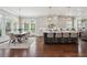 Spacious kitchen with stainless steel appliances, large island, and adjacent dining area at 3185 Casteel Ne Rd, Marietta, GA 30062