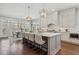 Beautiful kitchen with a large island, white cabinets, and a view of the dining area at 3185 Casteel Ne Rd, Marietta, GA 30062
