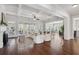 Spacious living room with fireplace, coffered ceilings, hardwood floors and sliding glass doors to outdoor spaces at 3185 Casteel Ne Rd, Marietta, GA 30062
