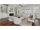 Inviting living room featuring a fireplace, built-in shelves, and plush seating, perfect for relaxation at 3185 Casteel Ne Rd, Marietta, GA 30062