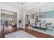 Open-concept living spaces including a dining area and living room with hardwood floors at 3185 Casteel Ne Rd, Marietta, GA 30062