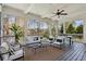 Covered porch with ample seating and dining area, perfect for enjoying the serene views of the surrounding landscape at 3185 Casteel Ne Rd, Marietta, GA 30062