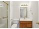A bathroom featuring a glass-doored shower, a single sink, and a towel rack at 3242 Monarch Pine Nw Dr, Peachtree Corners, GA 30071