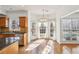 Bright kitchen nook with hardwood floors, and a beautiful bay window overlooking the yard at 3242 Monarch Pine Nw Dr, Peachtree Corners, GA 30071
