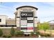 Peachtree Corners Town Center sign with a list of restaurants and retail businesses at 3242 Monarch Pine Nw Dr, Peachtree Corners, GA 30071