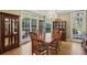 Charming dining room featuring hardwood floors, ample natural light, and classic décor at 535 Cameron Manor Way, Atlanta, GA 30328