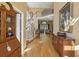 Grand foyer with hardwood floors, staircase, and elegant furnishings creating a welcoming entrance at 535 Cameron Manor Way, Atlanta, GA 30328