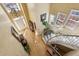 High-angle view of foyer with winding staircase and chandelier lighting at 535 Cameron Manor Way, Atlanta, GA 30328