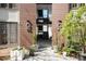 Apartment building entrance with well-maintained landscaping at 1445 Monroe Ne Dr # G3, Atlanta, GA 30324