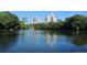 Lake in the community with trees and skyline backdrop at 1445 Monroe Ne Dr # G3, Atlanta, GA 30324