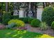 Carlyle Heights Condominium signage with surrounding manicured landscaping at 1445 Monroe Ne Dr # G3, Atlanta, GA 30324