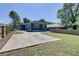 Backyard featuring a concrete driveway and a fence, providing convenient parking and privacy at 1497 Rogers Sw Ave, Atlanta, GA 30310