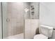 Contemporary shower featuring sleek tile work and modern fixtures offering a spa-like experience at 1497 Rogers Sw Ave, Atlanta, GA 30310