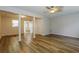 Bright, open living room with durable wood-look floors and neutral paint tones throughout at 8409 Carlington Ln, Jonesboro, GA 30236