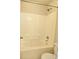 Bright bathroom features a shower with tiled walls and a showerhead at 1172 Preserve Park Dr, Loganville, GA 30052
