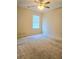 Bedroom with a ceiling fan and large window at 1172 Preserve Park Dr, Loganville, GA 30052