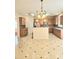Open kitchen with granite countertops, stainless steel appliances, and tile flooring at 1172 Preserve Park Dr, Loganville, GA 30052