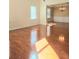 Bright and open living room with hardwood floors and lots of light at 1172 Preserve Park Dr, Loganville, GA 30052