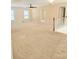 Carpeted loft with two large windows and ceiling fan at 1172 Preserve Park Dr, Loganville, GA 30052