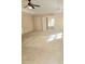 Spacious main bedroom with carpet, tray ceiling, and a doorway to the ensuite at 1172 Preserve Park Dr, Loganville, GA 30052