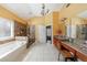 Bathroom with double sink vanity, a stone shower, and a large tub at 1540 Turtle Pond Dr, Hoschton, GA 30548