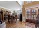 Cozy dining nook featuring wood floors, a bay window, and stylish furnishings for intimate gatherings at 1540 Turtle Pond Dr, Hoschton, GA 30548