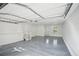 Clean, bright, and spacious garage, freshly painted, ready for new owners to utilize at 7410 Fields Dr, Cumming, GA 30041