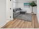 Cozy living room with modern decor, a comfortable couch, and indoor plants at 7410 Fields Dr, Cumming, GA 30041
