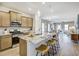 Well-appointed kitchen with a large island, stainless steel appliances, and open-concept design at 112 Asher Dr, Carrollton, GA 30116