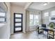 Bright office space featuring modern door, natural light, and a stylish work area at 112 Asher Dr, Carrollton, GA 30116