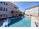 Beautiful backyard view with a sparkling pool, and deck, offering a perfect space for relaxation and outdoor enjoyment at 1775 Rockwater Rd, Marietta, GA 30066