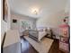 Bright bedroom showcasing neutral colors, hardwood floors, and large windows for plenty of natural light at 1775 Rockwater Rd, Marietta, GA 30066