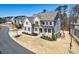 Beautiful two-story home with a combination of stone and siding, complemented by a well-maintained front yard at 1775 Rockwater Rd, Marietta, GA 30066