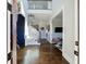 Bright foyer with hardwood floors, staircase to second floor, and an entry to playroom at 1775 Rockwater Rd, Marietta, GA 30066