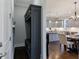Mud room with a view of a gourmet kitchen featuring gray cabinets and stainless appliances at 1775 Rockwater Rd, Marietta, GA 30066