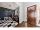 Inviting playroom with gray plank accent wall, hardwood floors, and a cozy seating area at 1775 Rockwater Rd, Marietta, GA 30066