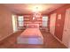 Comfortable bedroom with striped accent wall, modern lighting, and neutral decor at 2270 Goodwood Se Blvd, Smyrna, GA 30080