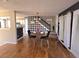 Dining room adjacent to the kitchen with black accent wall and modern chandelier at 2270 Goodwood Se Blvd, Smyrna, GA 30080