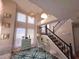 Welcoming entryway boasting high ceilings, lots of windows and natural light, and stairs to the upper level at 2270 Goodwood Se Blvd, Smyrna, GA 30080