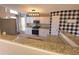 Bright kitchen features stainless appliances, stone countertops, and modern lighting at 2270 Goodwood Se Blvd, Smyrna, GA 30080